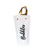 Single wine tote with "bubbles" screen printed on the outside and corresponding gold leather handle.